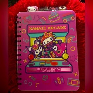 Sanrio Hello Kitty spiral journal with grid pages and four tabs